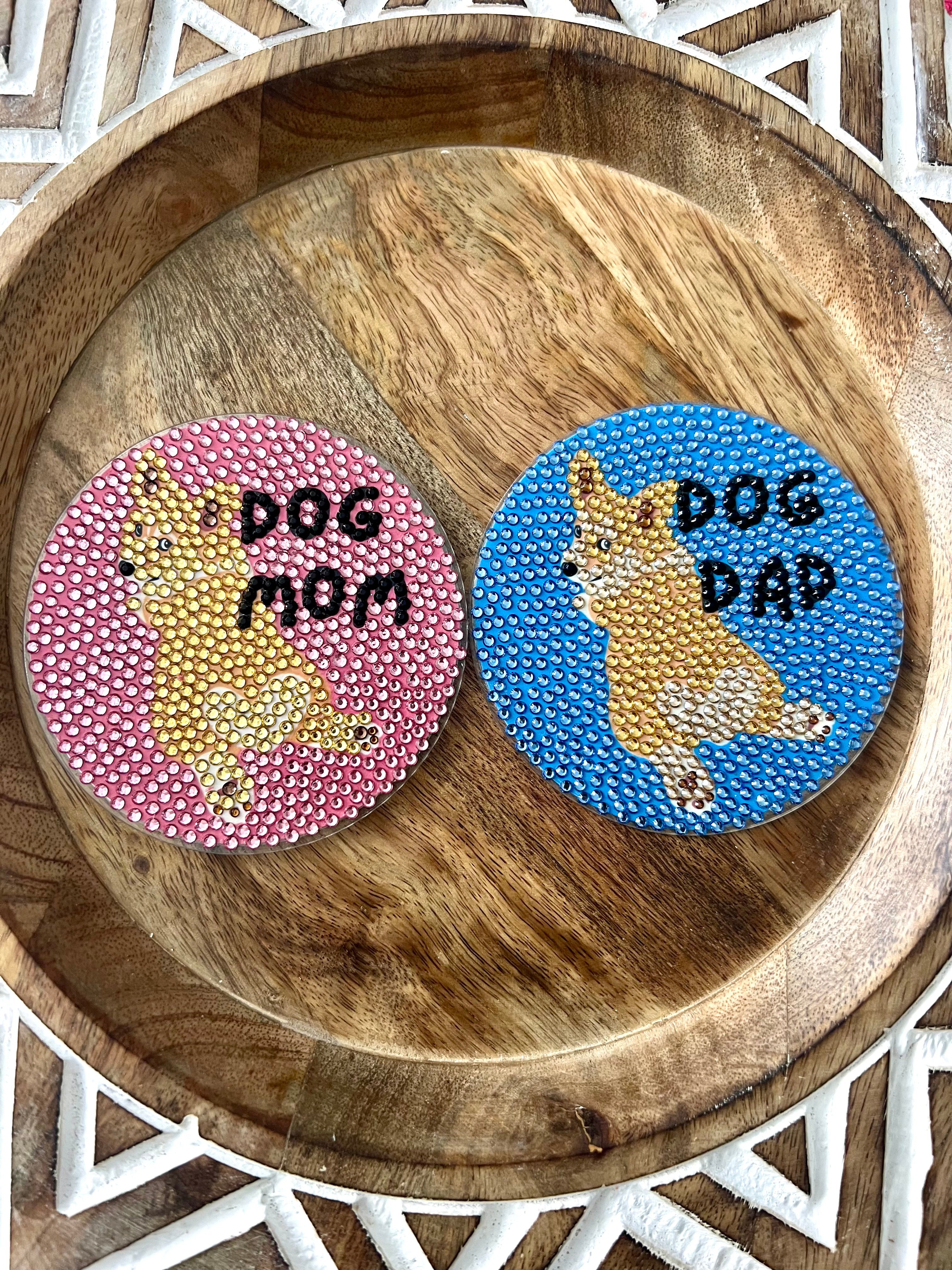 Bedazzled coasters with "Corgi Mom" and "Corgi Dad" designs, perfect for Corgi lovers. blinged decor