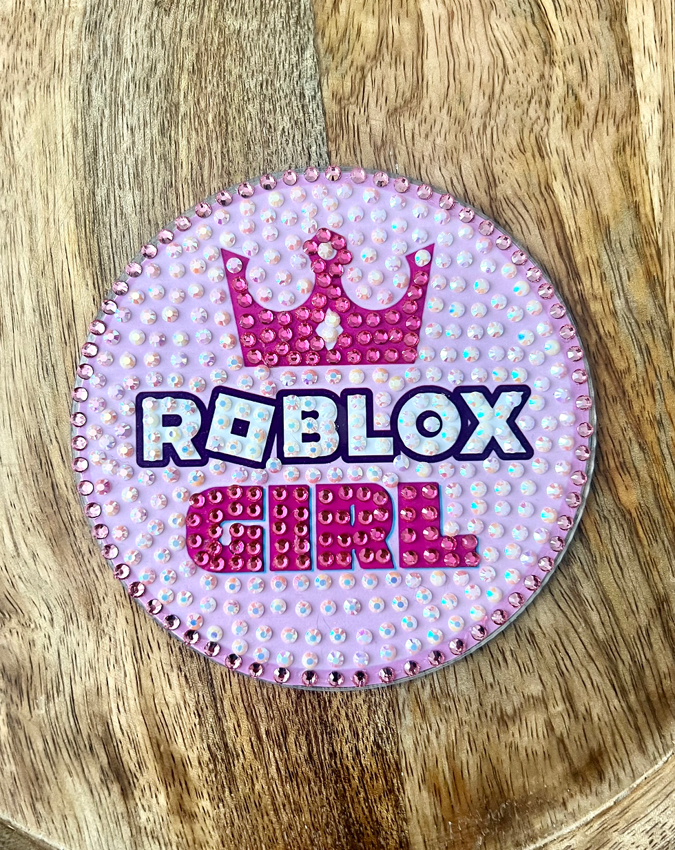 Thumbnail: Bedazzled coaster with a Roblox crown and pink background, perfect for young Roblox gamers.