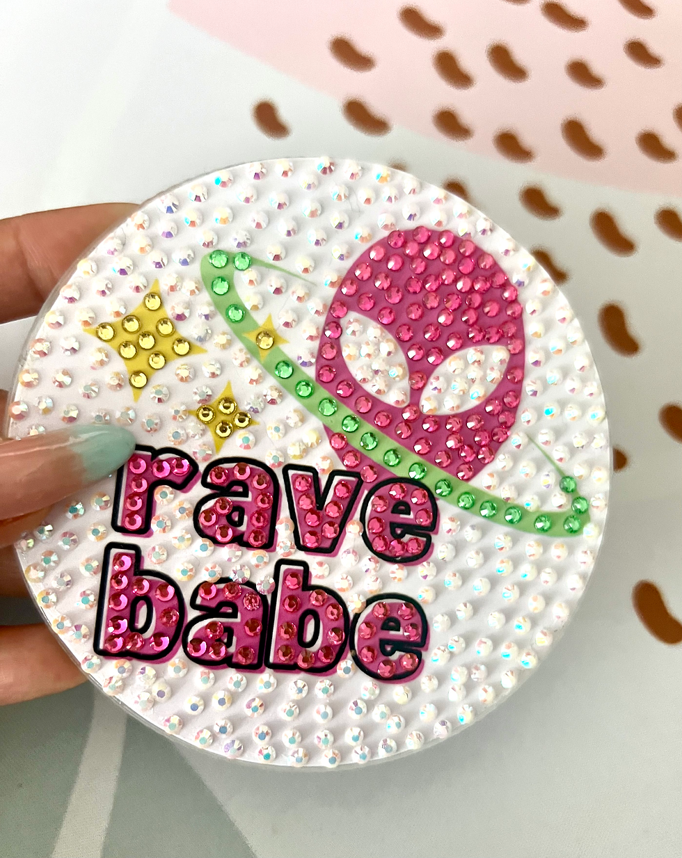 Thumbnail: Bedazzled coaster with alien in space design, perfect for rave and festival enthusiasts.