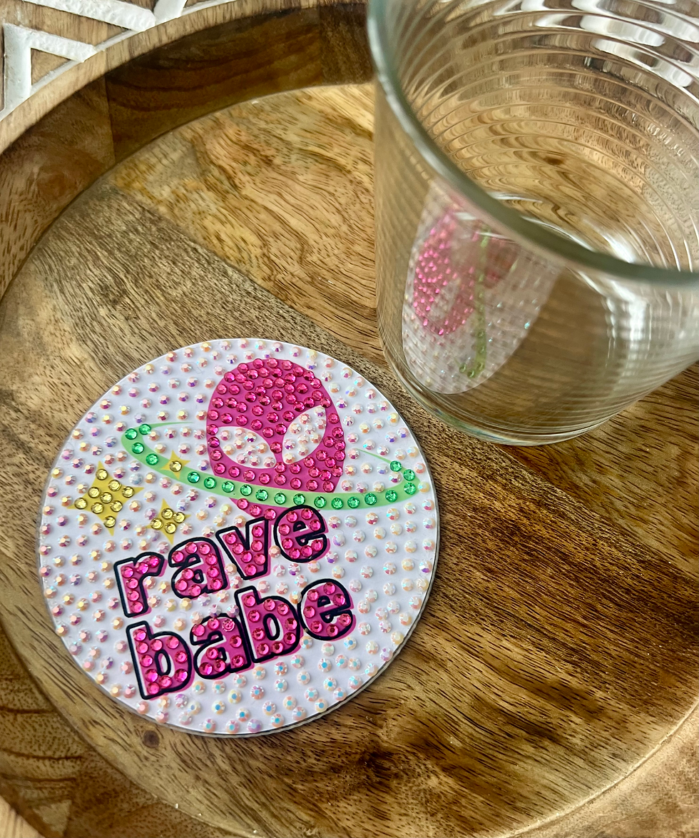 Thumbnail: Bedazzled coaster with alien in space design, perfect for rave and festival enthusiasts.