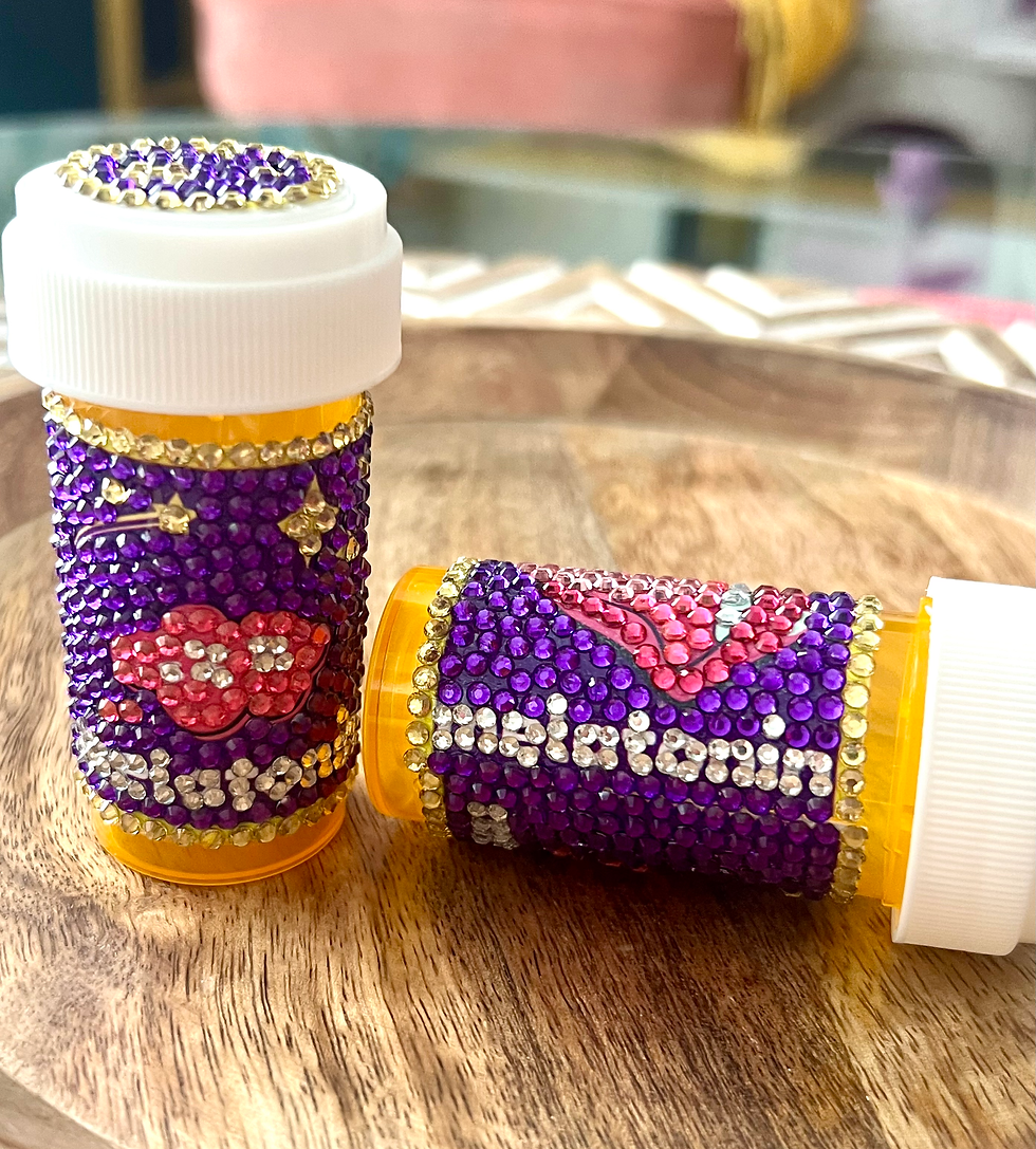 Handcrafted bedazzled pill bottle with "zzz" design in pink clouds and yellow stars, hot pink mouth and tongue. sleep well