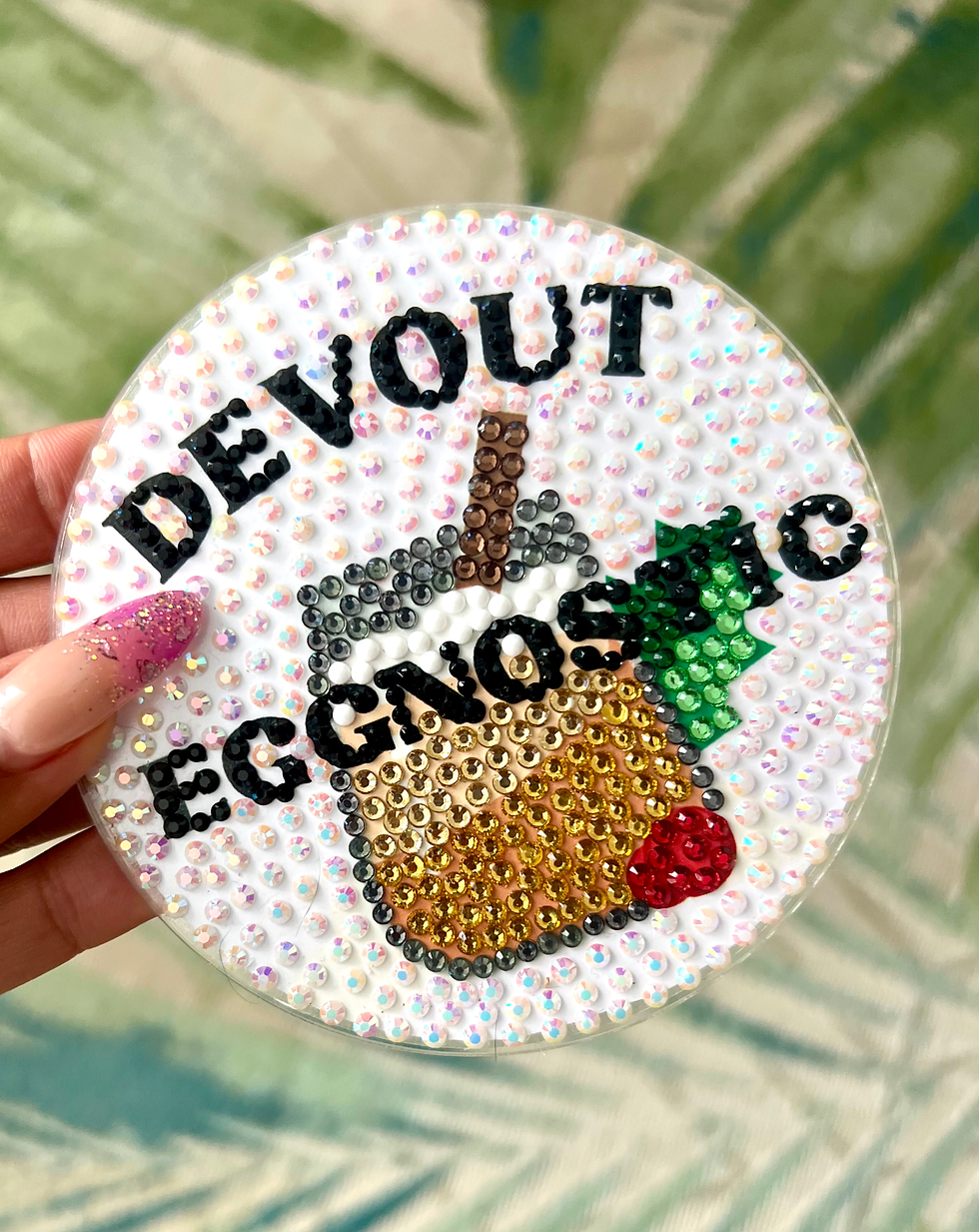 Thumbnail: "Devout Eggnostic" coaster with a festive design. red rhinestones.