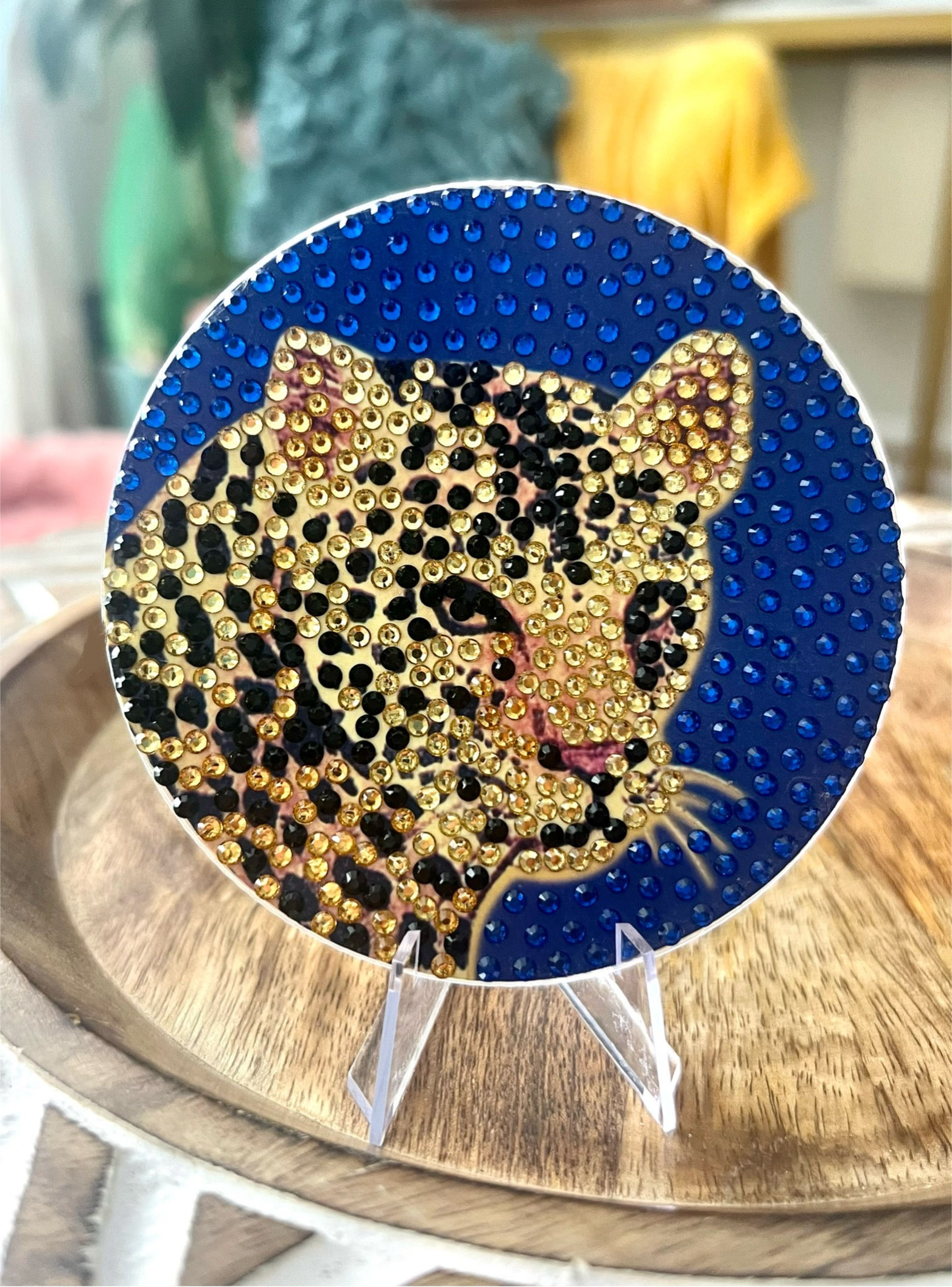 Bedazzled coaster featuring a cheetah design, perfect for coffee tables or bookshelves.