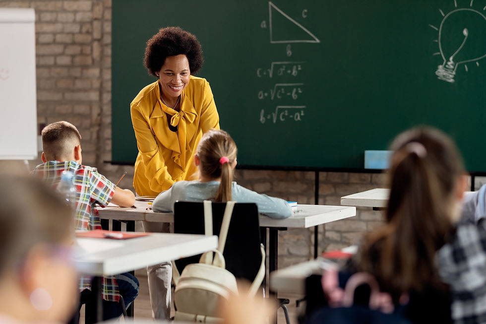 happy-black-elementary-school-teacher-taking-her-students-classroom.jpg