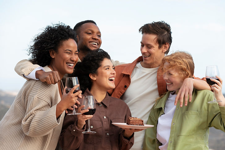 group-friends-posing-with-glasses-wine-cake-outdoor-party.jpg