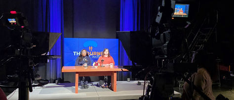 Photo of Monica Fox and Sara Jane Charles in the CAN TV studio