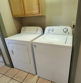 The condo is equipped with a full size washer and dryer..png