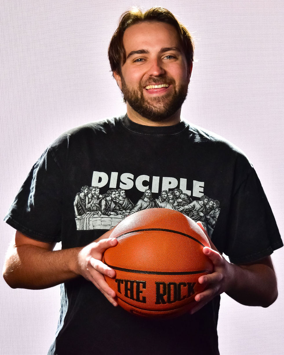 Bryce Greene, Youth Ministry Coordinator loves to hoop it up with his fellow students