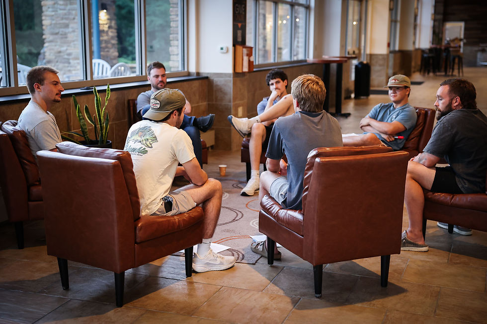 Group of young adults connecting and growing together in faith during a Bible study at Damascus Road Church