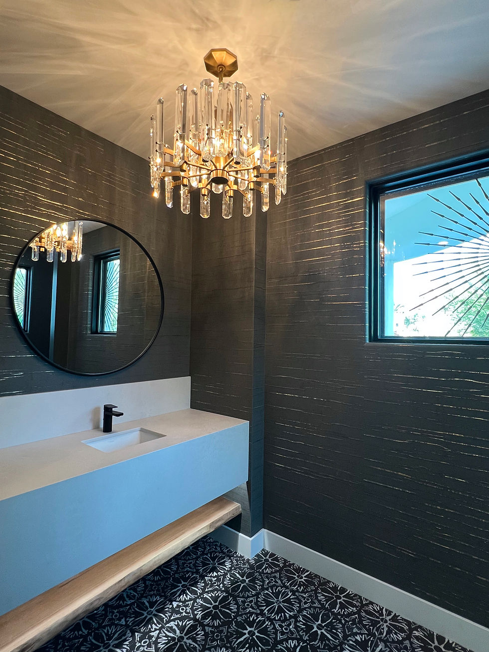 Close-up of vintage brass chandelier hanging over modern living room