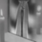 The cover art for Sam Wenc's, Language at an Angle album, showing two lit candles reflecting in a distorting mirror with wavy black and white stripes, creating an abstract, surreal atmosphere.