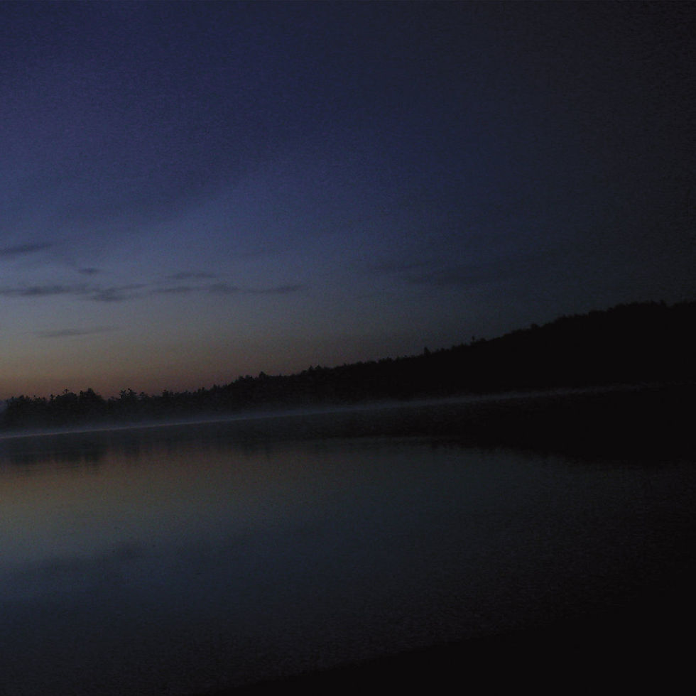 The cover for Tim Corpus' Place of Rest album, showing dusk over a calm lake, dark treeline silhouetted against a blue-purple sky and misty water, quiet and serene.