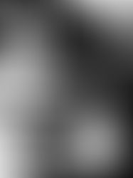 High-contrast black-and-white abstract, angular yet fluid graphic; large text reads NUJAZZ.
