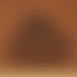 The cover for Richard Norris's Oracle Sound Three album showing a brown cover with a black sun design, text "ORACLE SOUND" and "VOLUME THREE" in bold. Retro, earthy aesthetic.
