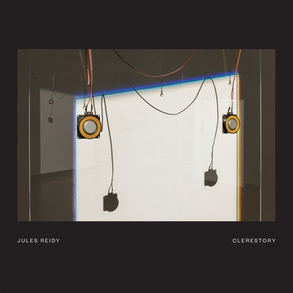 The cover for Jules Reidy's Clerestory album, showing speakers and cords that frame a white panel in a dark gallery; text reads JULES REIDY and CLERESTORY.