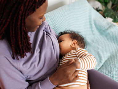 A mom breastfeeding her baby.