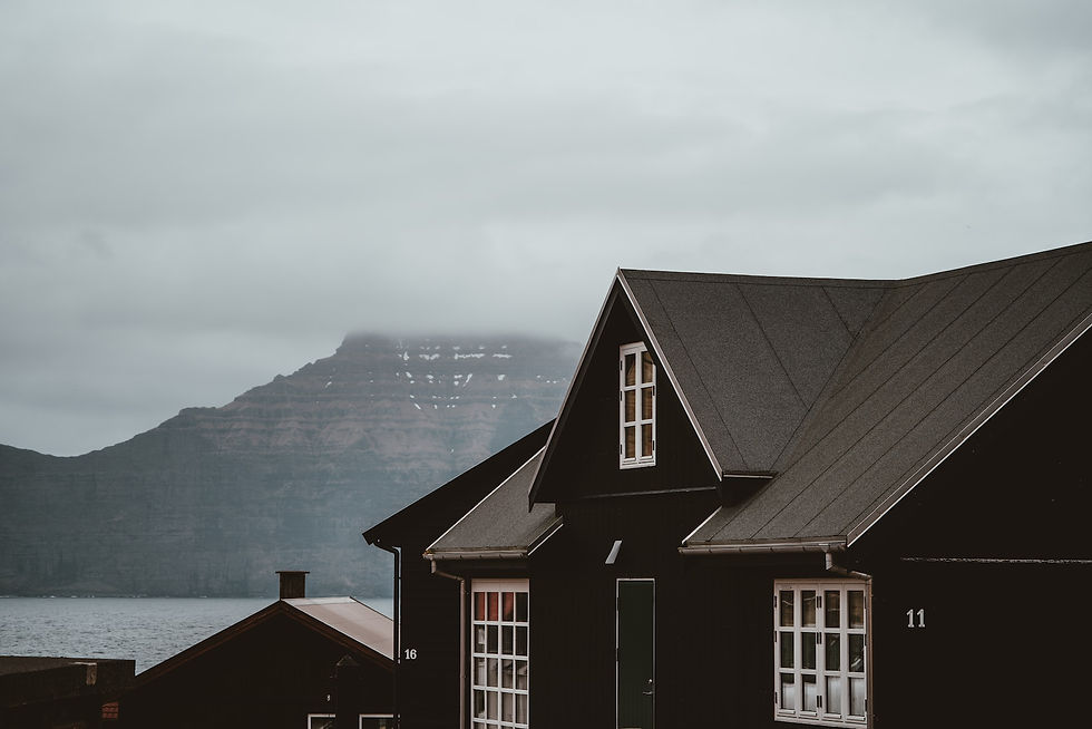 A house in the mountains on a gray rainy day