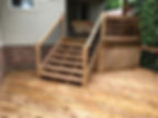 Custom home builder Muskoka project featuring a wooden deck.