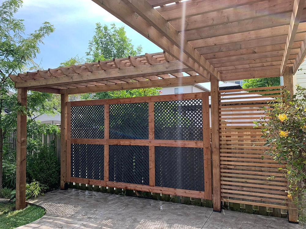 Custom home builder Muskoka projects: Pergola with privacy screen