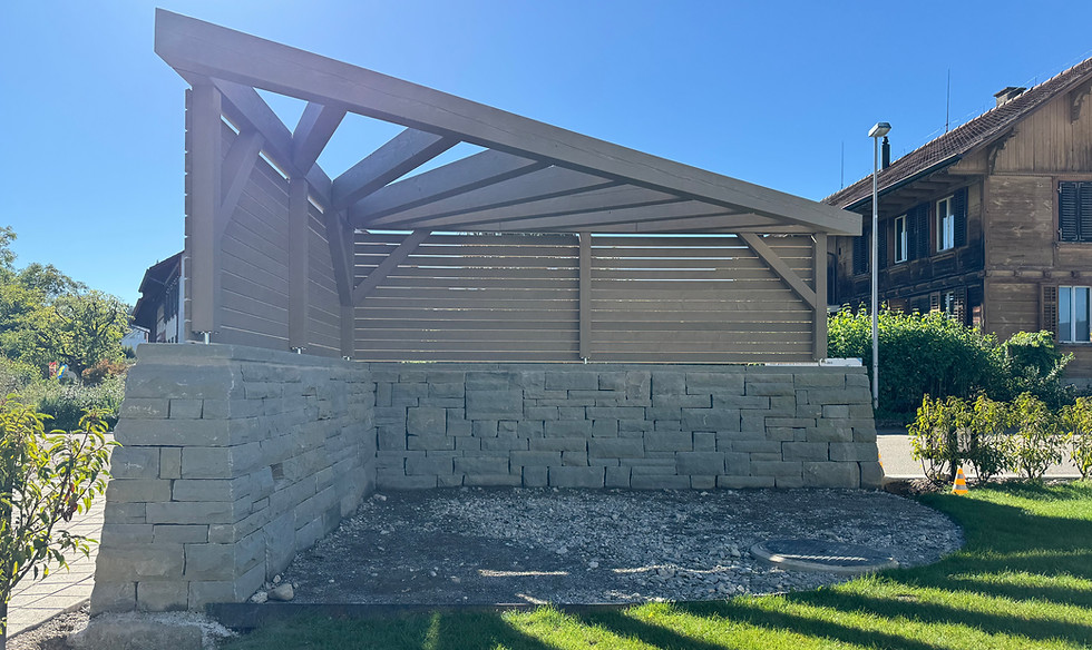 Natursteintrockenmauer & Pergola von Drack Gartenbau. Gärtner Winterthur