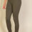 Thumbnail: A person is wearing olive green leggings and standing against a neutral background. Only the lower half of the body is visibl