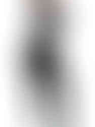 A woman wearing Cusuti's Multicolored Sequin Stretchy Pants, showcasing the form-fitting cut and dazzling sequin fabric.