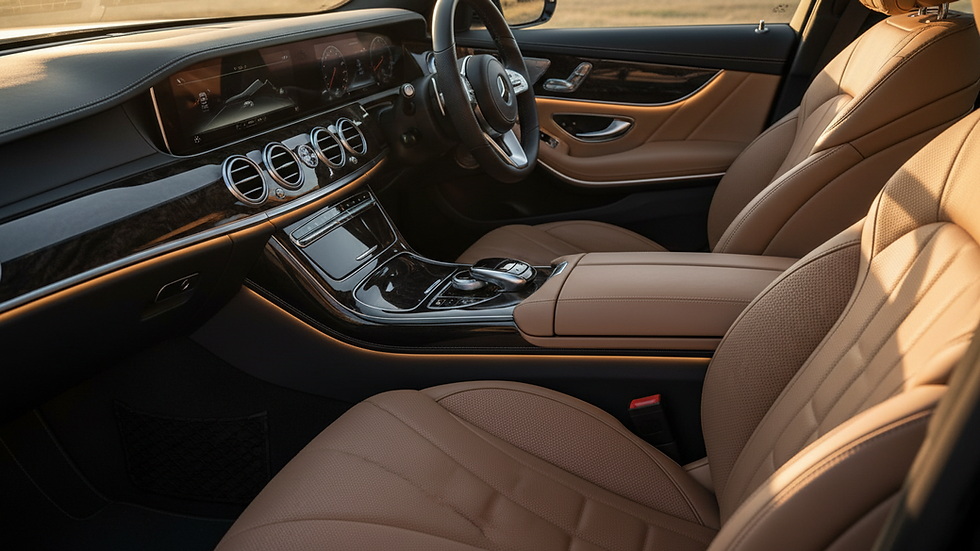 Close-up view of a luxury car interior with leather seats and ambient lighting