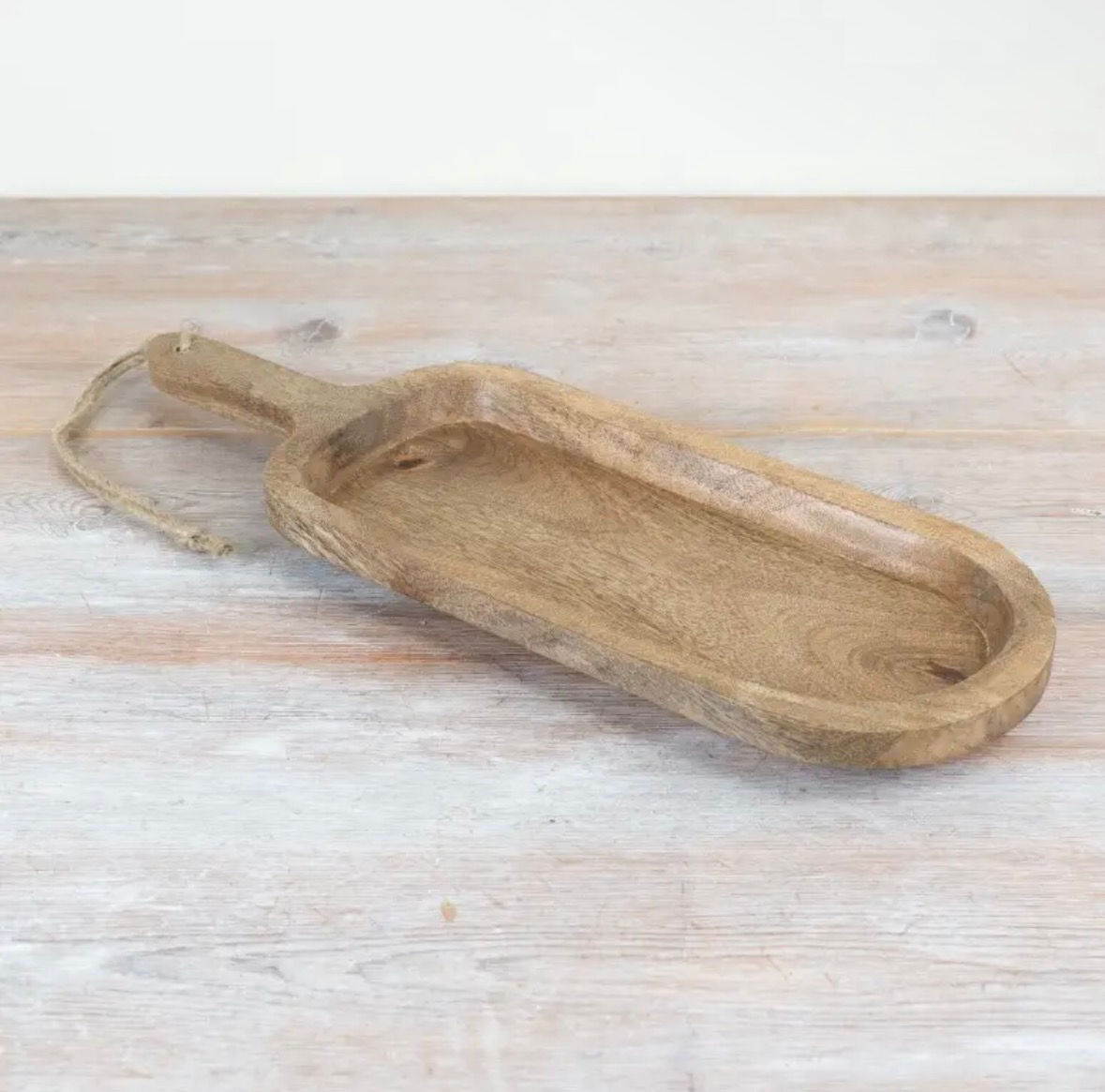 Oblong chopping board.