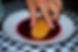 Dipping the Biscotti Savalai Morbidi in the Alchermes Liqueur for the Italian Zuppa Inglese Recipe