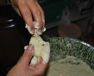 Forming the Zeppole by hand - twisting - Calabrese Zeppole Recipe
