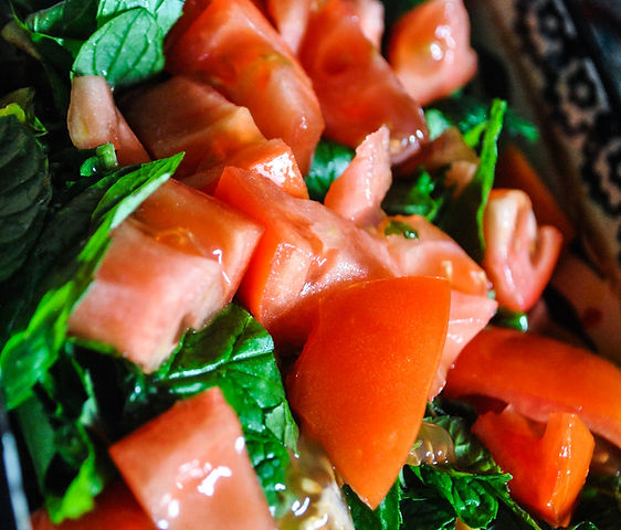 tomatoes over a bed of romaine and mint, cypriot salad