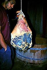 Prosciutto hanging in a basement in Norway