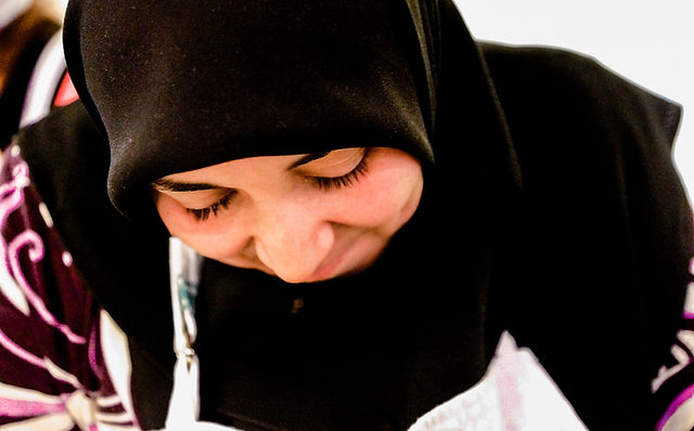 Imane cutting Parsley for the Syrian Tabbouli Recipe at Tawlet Restaurant in Beirut, Lebanon