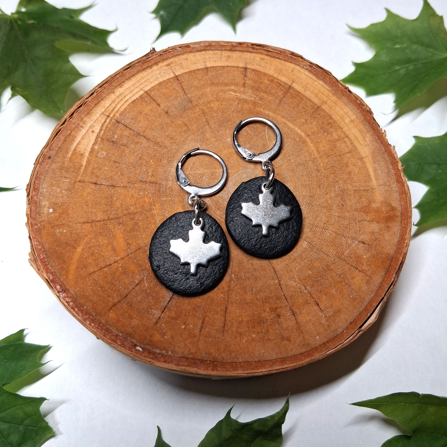 Steel charm earrings