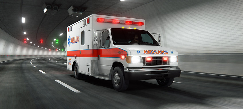 ambulance driving through a tunnel