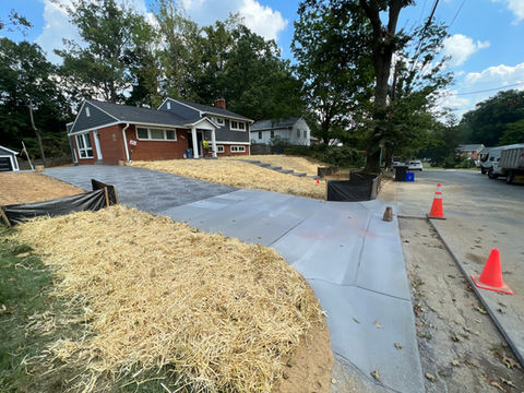 Upgrade your curb appeal with a smooth, durable concrete driveway. Designed for both function and style, our driveways can handle heavy use while enhancing the beauty of your home.
