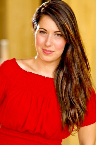 Safia valines headshot red top.jpg