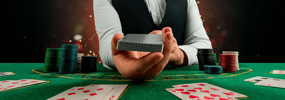 Dealer presents cards; poker chips, cards on green felt table