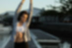 woman in athletic clothes stretching