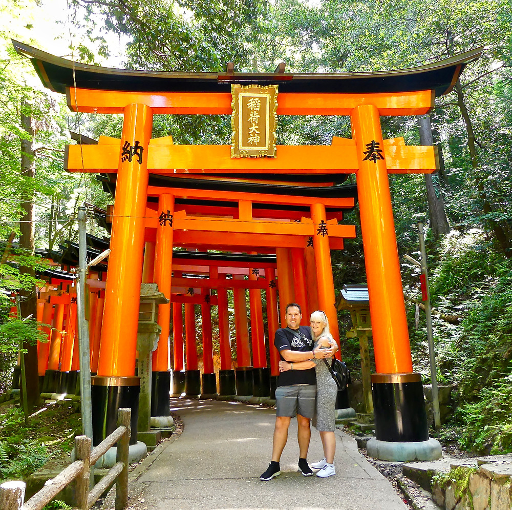 Couple photo at mid point entrance to gates
