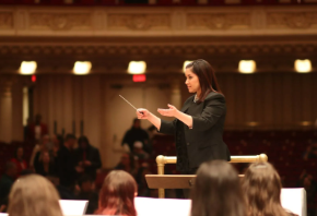 Ms. Lacasse conducting at Carnegie Hall