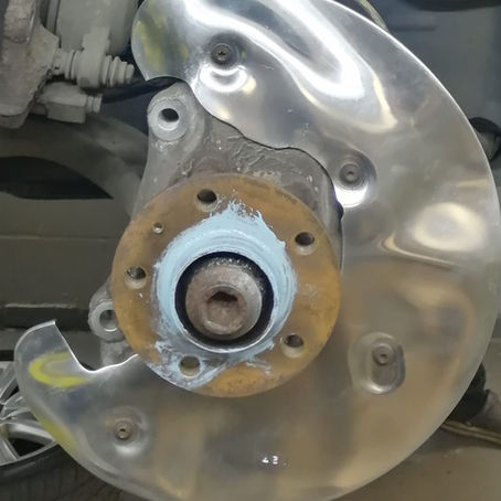 Damaged brake disc dust shield inspected during brake repair at FLEETDOC Peterborough