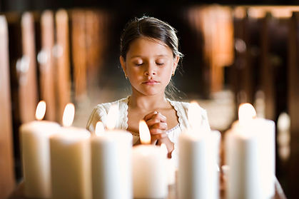 girl praying in church