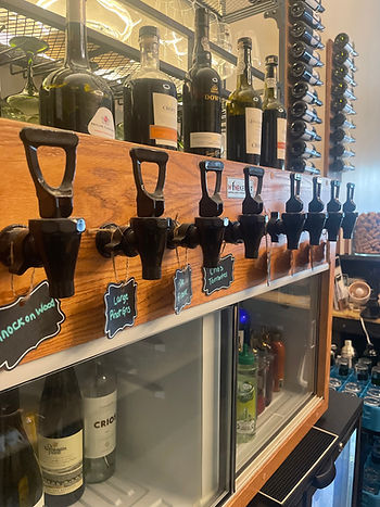 Behind the bar wine dispenser.jpeg