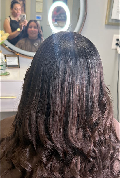Hydrated, restored hair after professional nutrition and reconstruction treatments