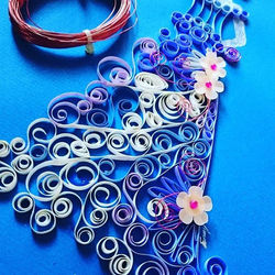 No basic shapes....free hand quilling with embellishments