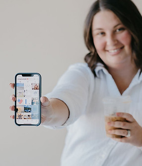 Lisa, the owner, showing her clients social media page