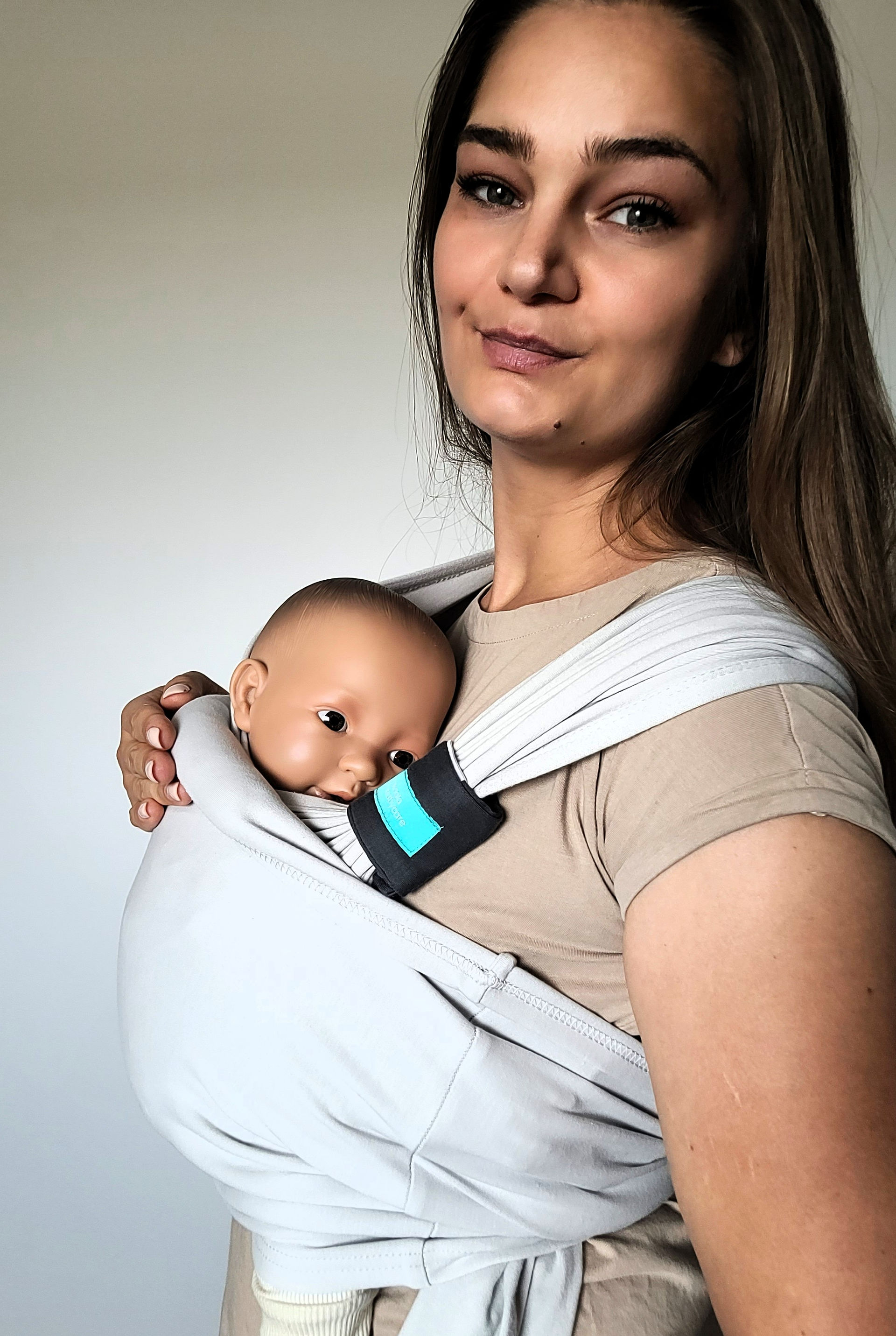 Zubehör zur Koala Cuddle 2 Babytrage: eine Nackenrolle und der sogenannte Magic Flip im Test