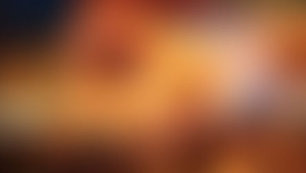 Hong Kong Investment Visa: People celebrate in a vibrant festival with a glowing dragon and sparklers in a colorful, confetti-filled night scene.