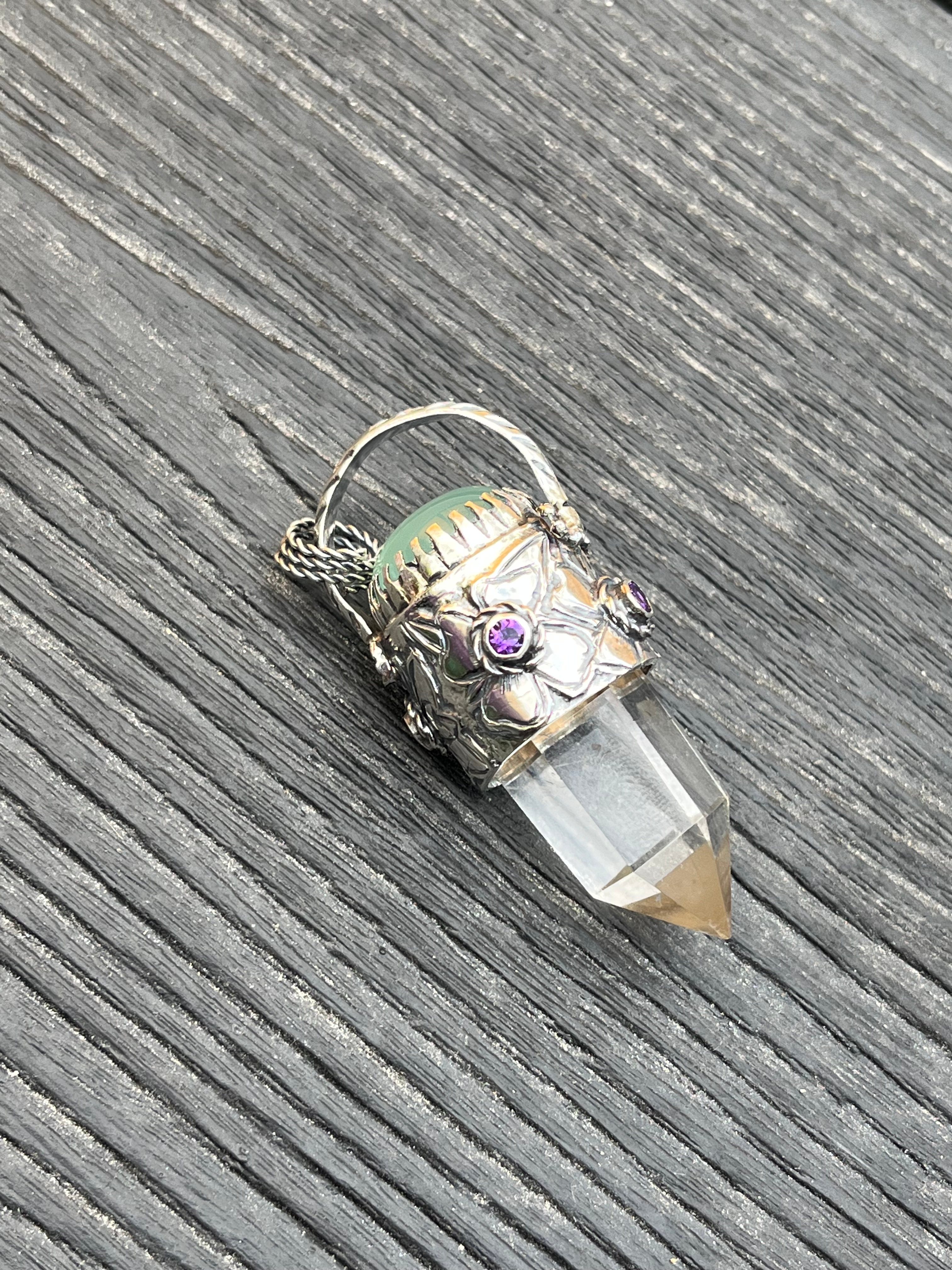 Amuleto flor ciruelo